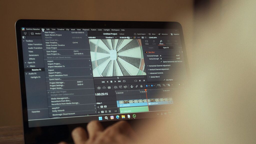 Laptop showing an AI video tool turning a script into a video with visuals and voiceover